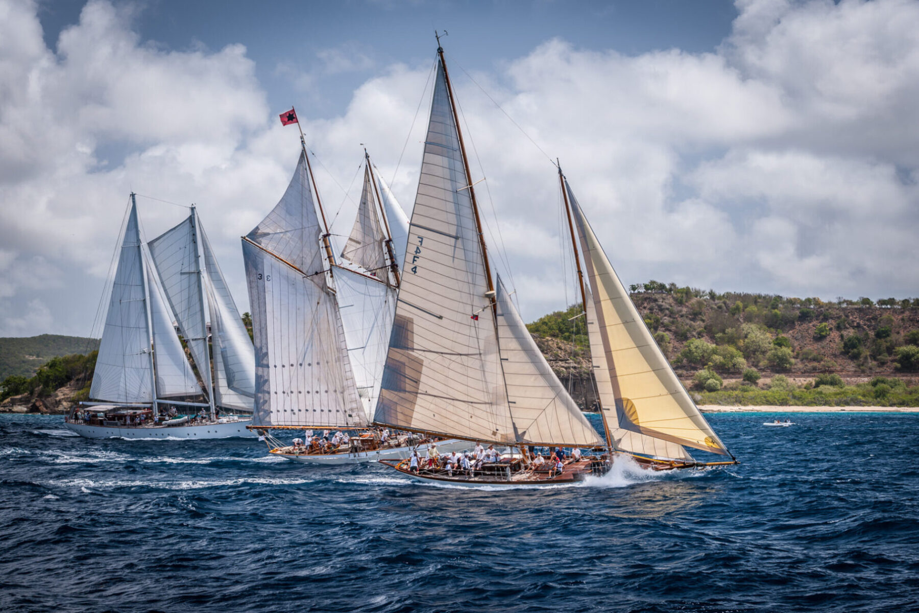 Three classic sailing yachts racing in Antigua 