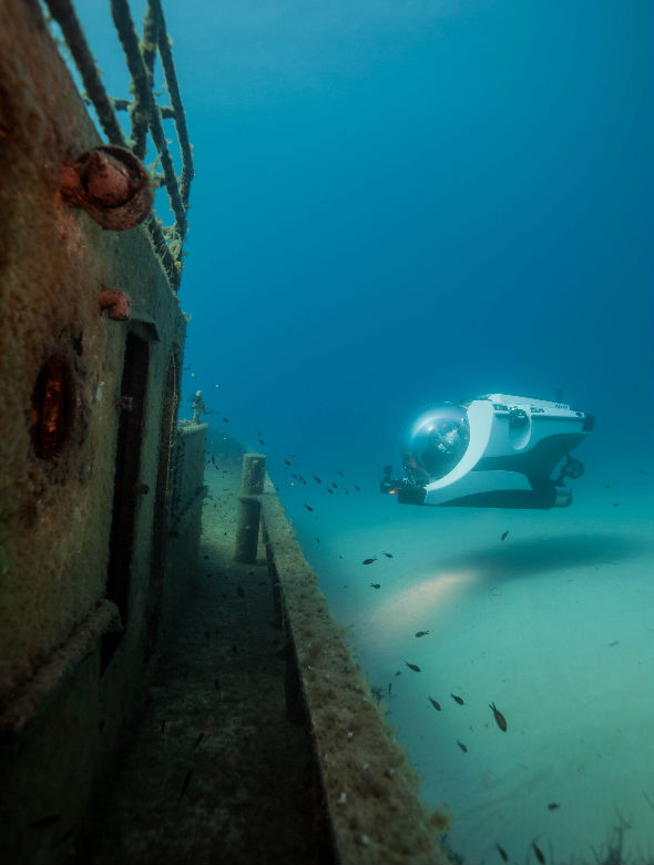 U-boat worx Super yacht sub 3 submersible underwater looking at a shipwreck